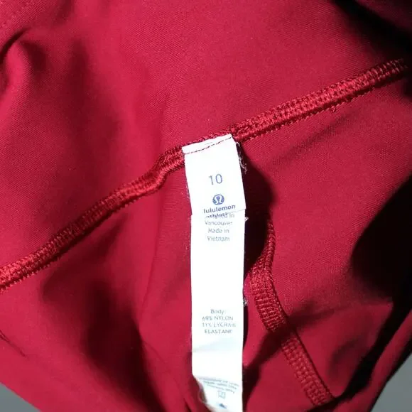 Lululemon Tight Stuff Tight Red and Silver Reflective Print Size 10